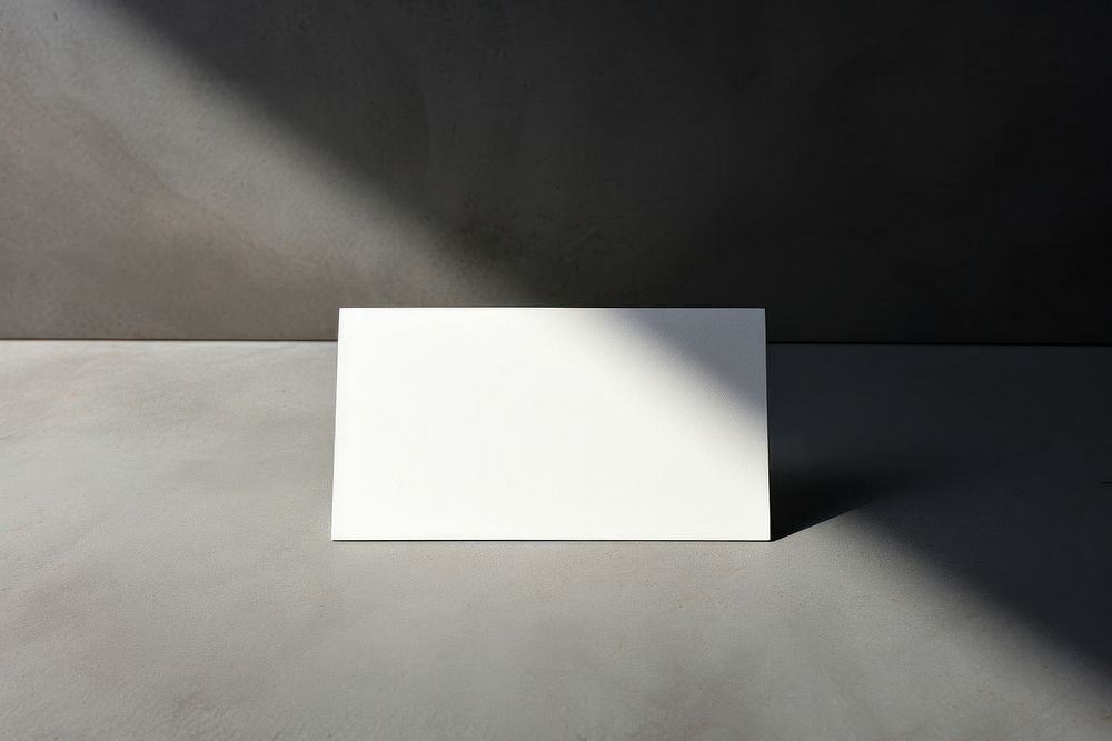 Business card mockup lighting table architecture.