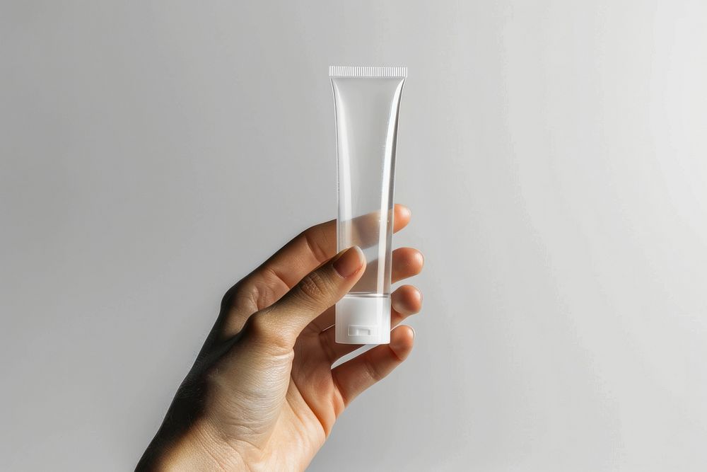Hand hold transparent cosmetic tube pottery glass vase.