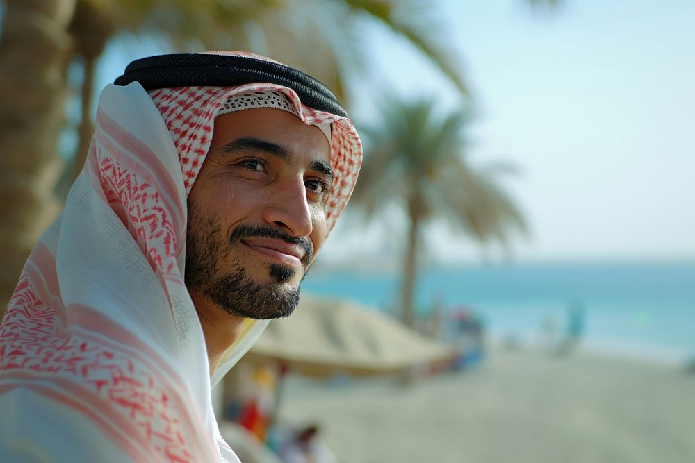 A happy Middle east man photography beach face.