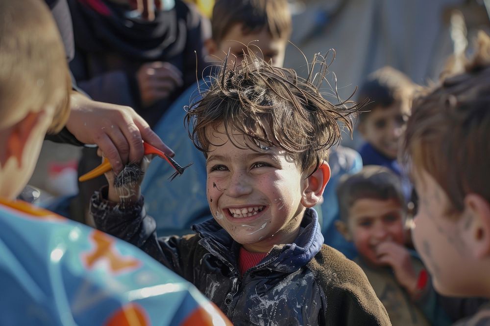 Happy refugee children have haircut person human smile.