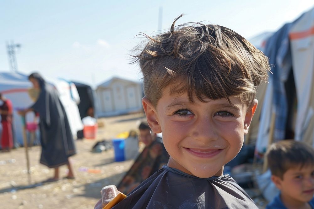 Happy refugee children have haircut photography hairdresser portrait.