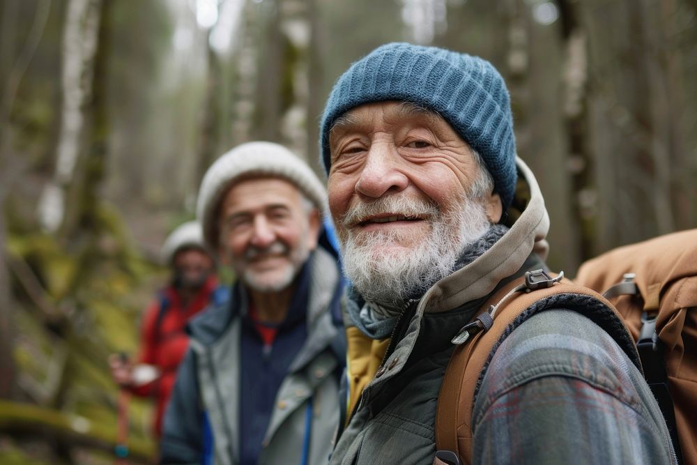 Smiling senior man hiking with friends photo photography recreation.