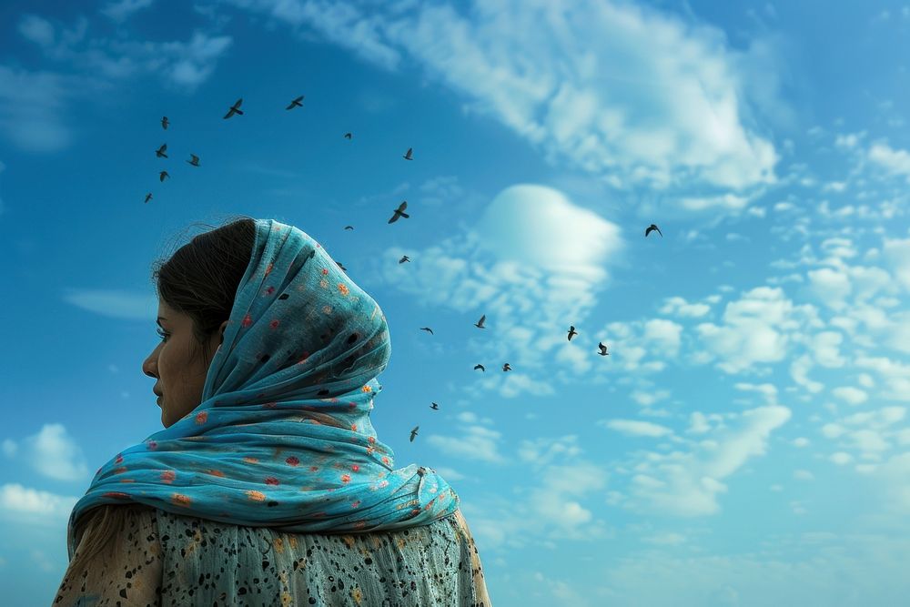 Refugee girl in the back photo bird sky.