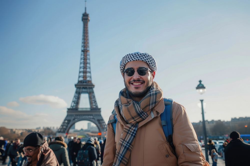 Happy middle east man tourist smiling tower architecture accessories.