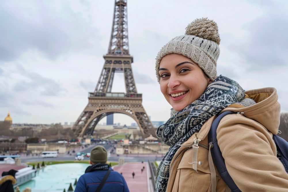 Happy middle east woman tourist smiling tower transportation architecture.