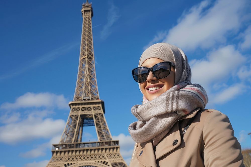 Happy middle east woman tourist smiling tower architecture photography.
