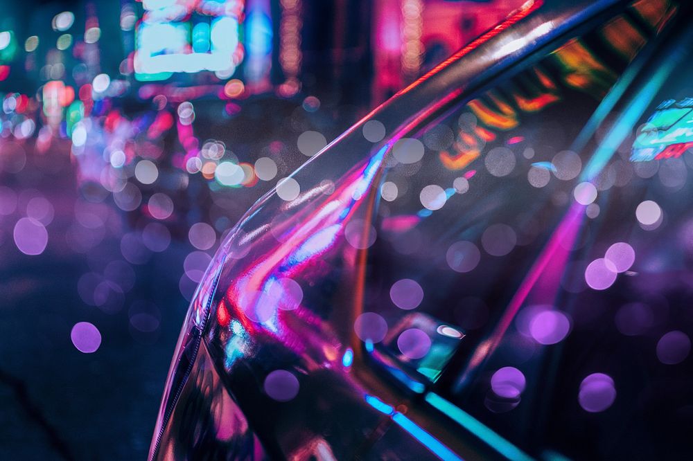 Car in a city with night lights