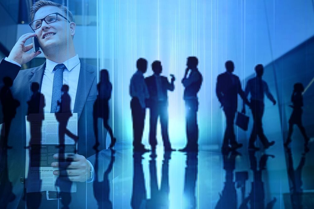 Business people in silhouette blue