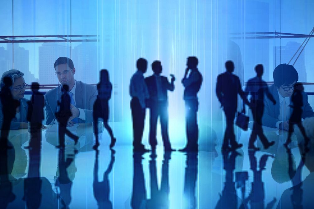 Business people silhouette in blue