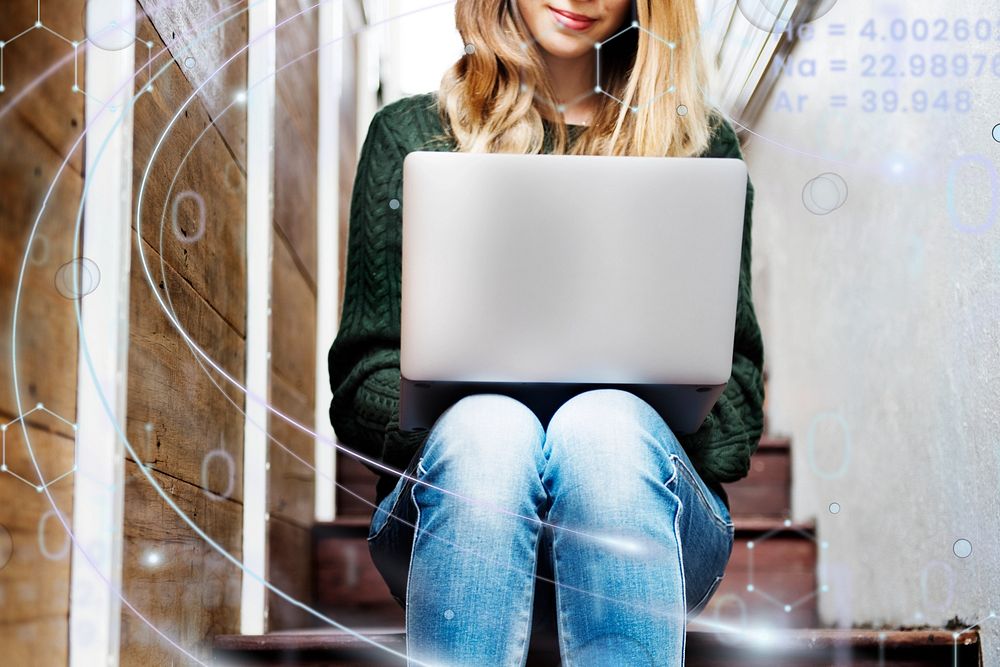 Young woman is using computer laptop