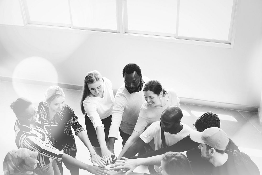 Diversity teamwork with joined hands | Free Photo Illustration - rawpixel