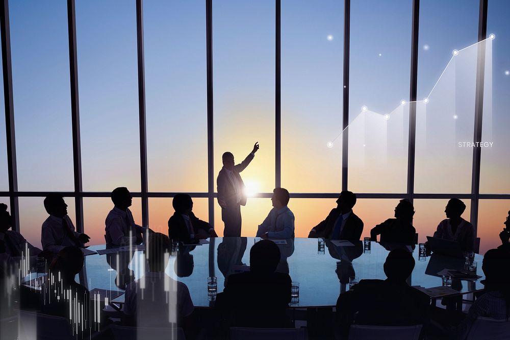Silhouette of business people in a meeting