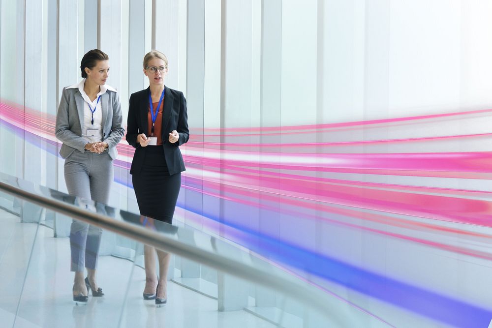 Two businesswomen working together in an office building