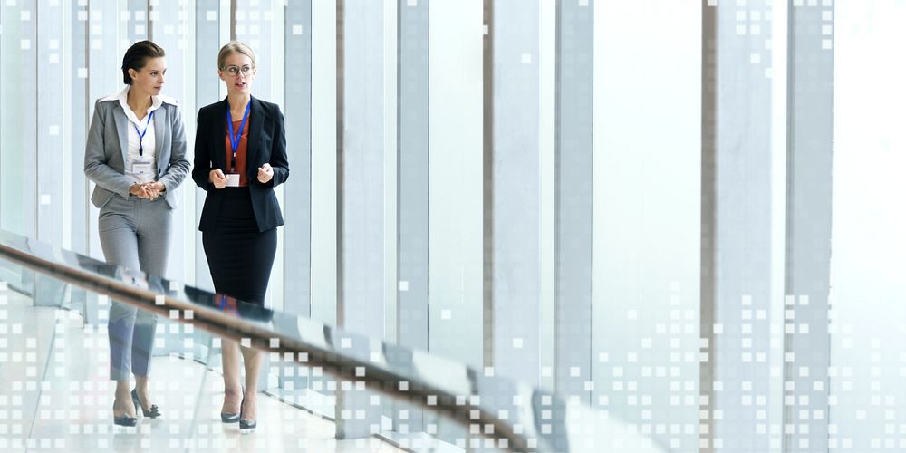 Two businesswomen working together in an office building