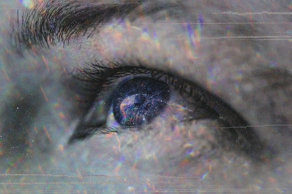 Woman eye with starry pupil