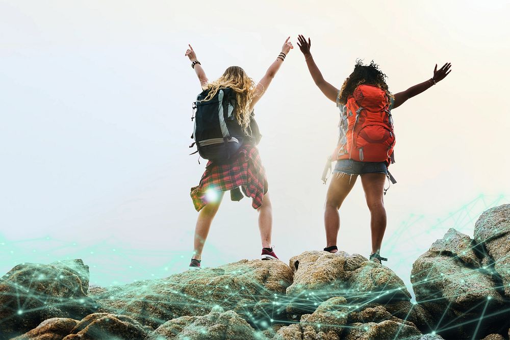 Female backpacker friends traveling together