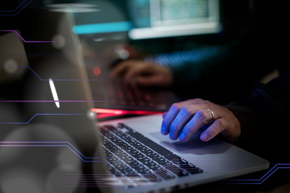 A hacker using computer photo