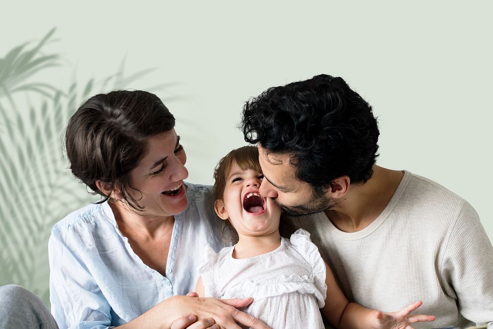 Family time photo of father, mother, and daughter