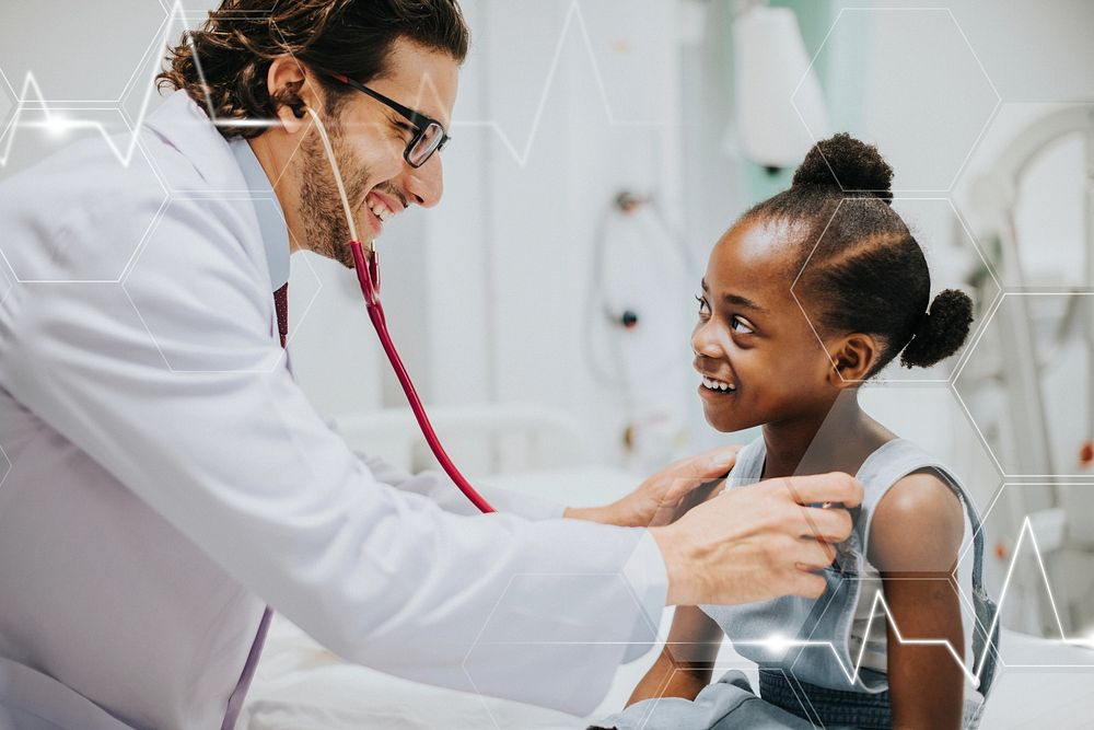 Friendly pediatrician checking a little girls heart