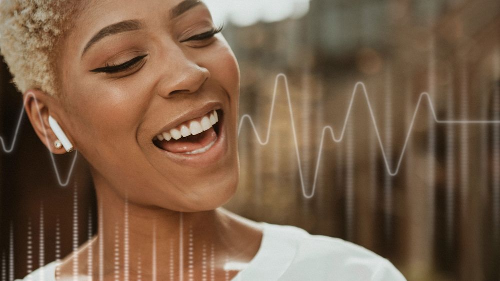 Cheerful black woman listening to music remix