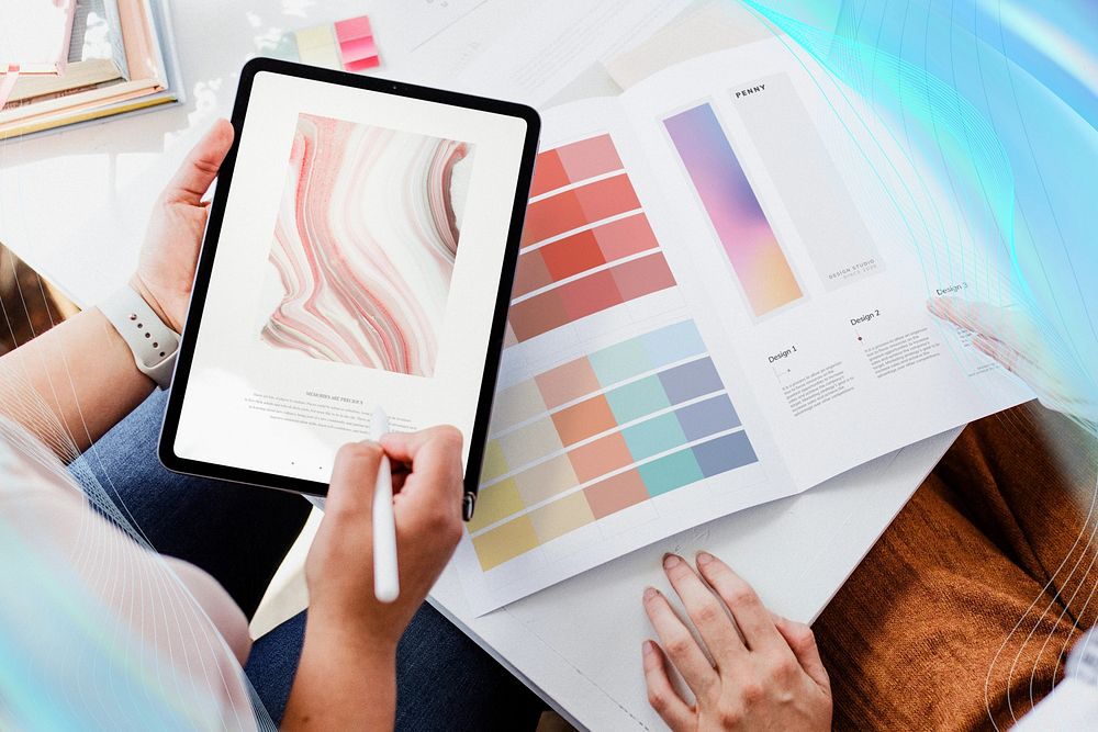 Women choosing a color scheme using a digital tablet