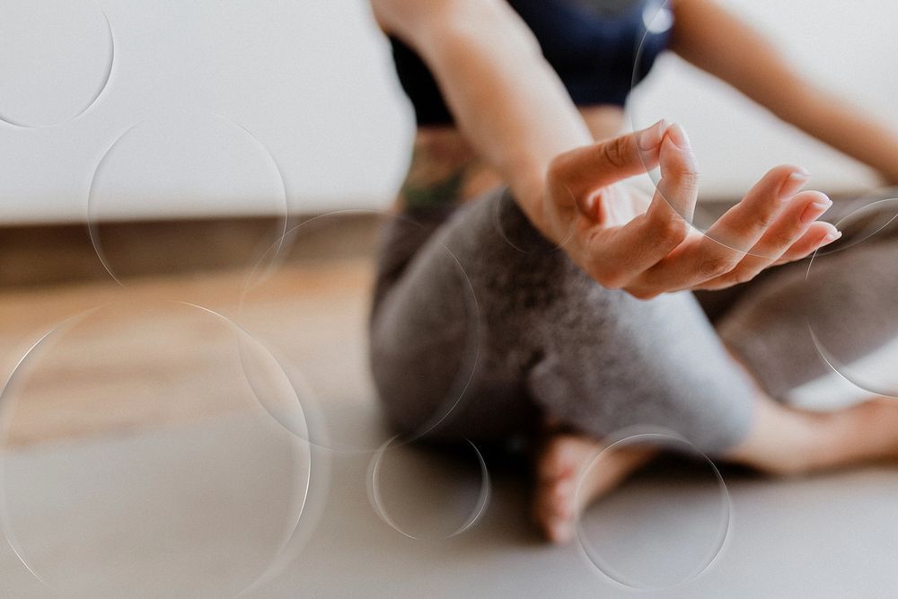 Fitness woman in a Padmasana pose