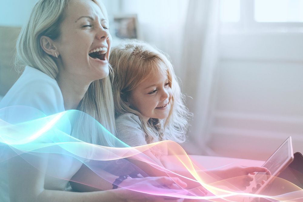 Mom and daughter watching on a digital tablet