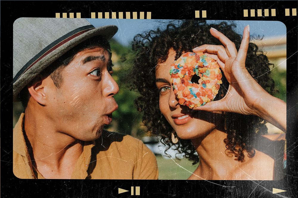 Friends having fun with a doughnut