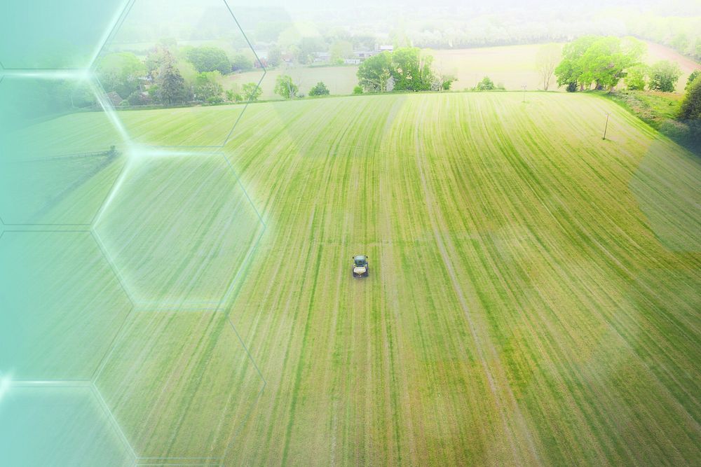 Drone view of a tractor on a field