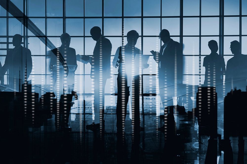 Abstract image of business people silhouette on glass window