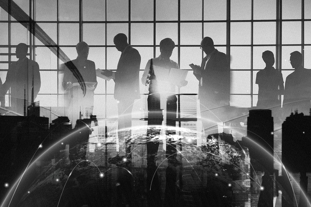 Abstract image of business people silhouette on glass window