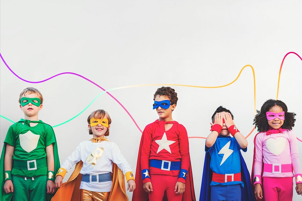 Diverse children in colorful superhero costumes