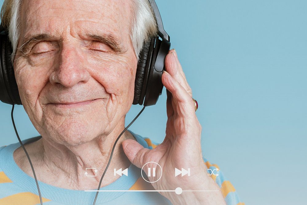 Senior man listening to music remix