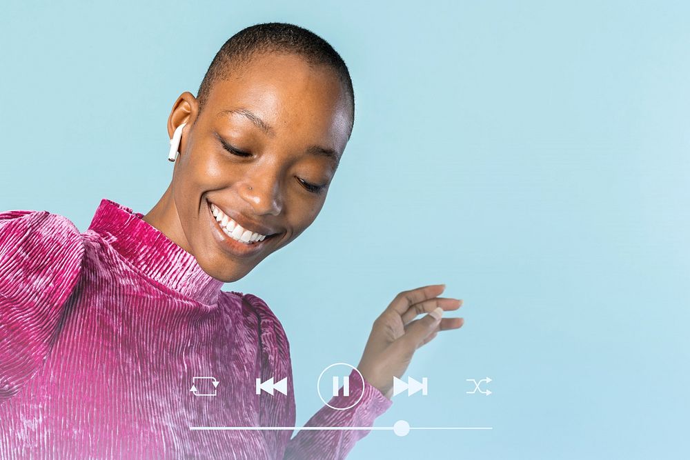 Black woman dancing with wireless earphones remix