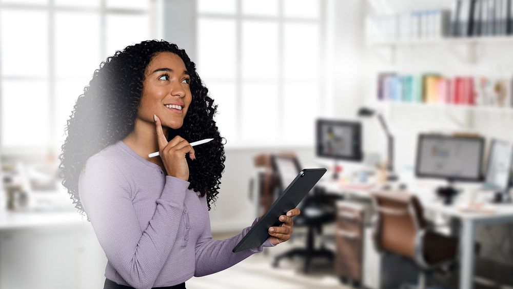 Woman using tablet in the office