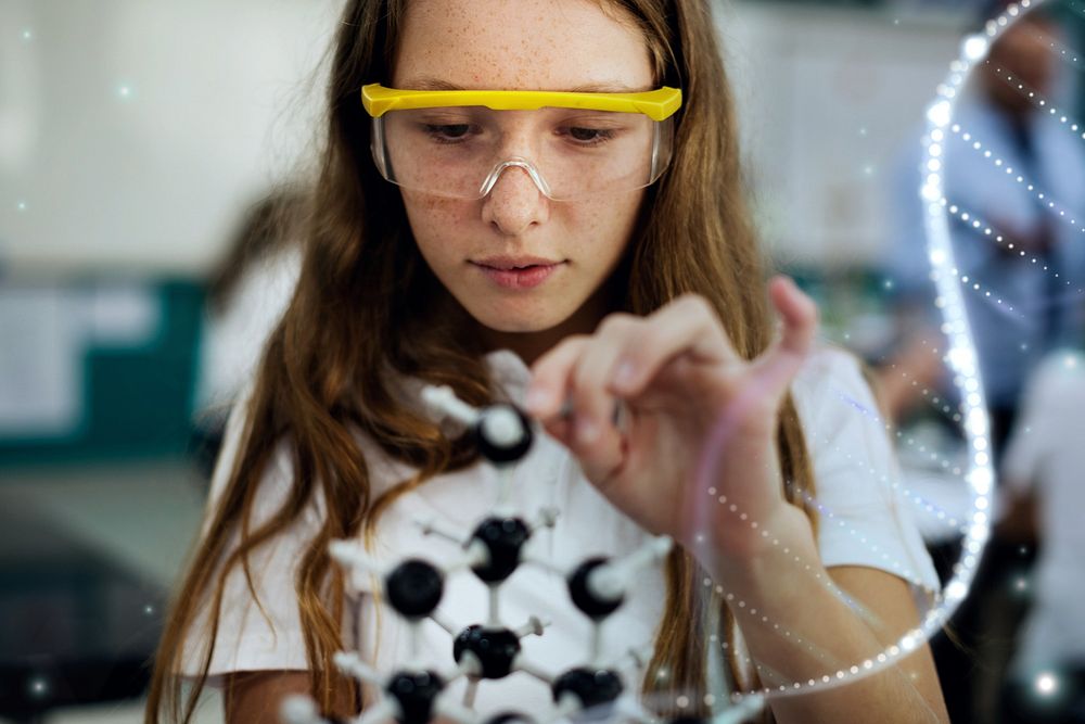 Girl student learning science in a classroom