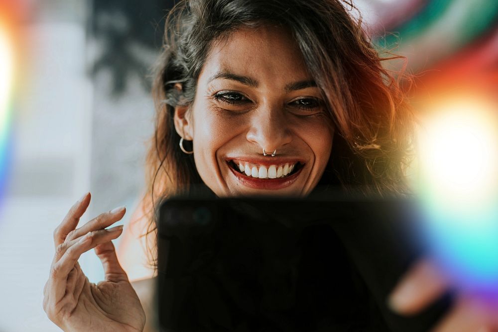 Happy woman having a video call