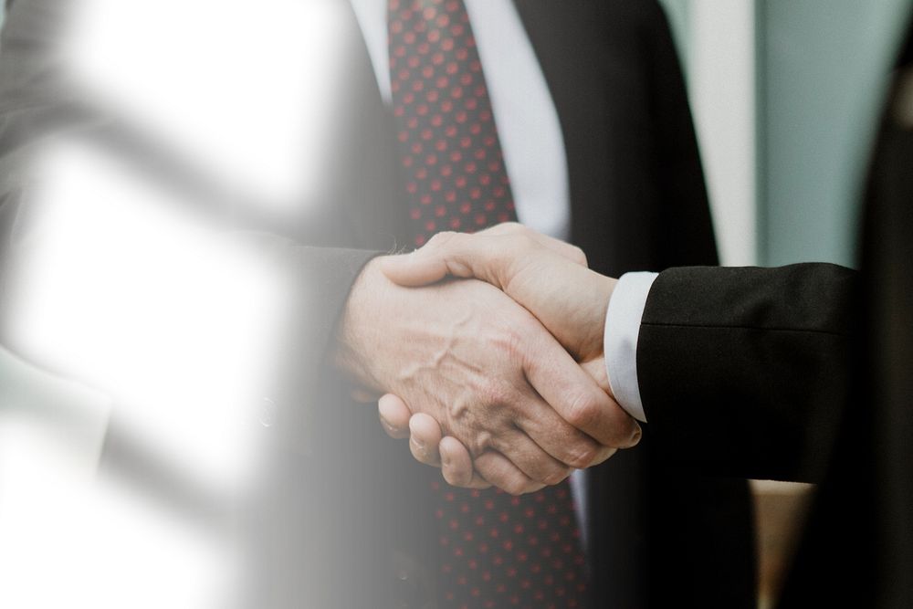 Businessmen making handshake for a deal