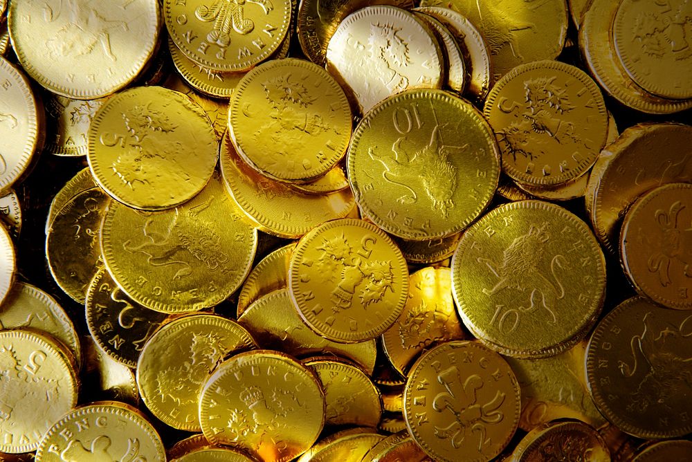 Pile of gold coins aerial view