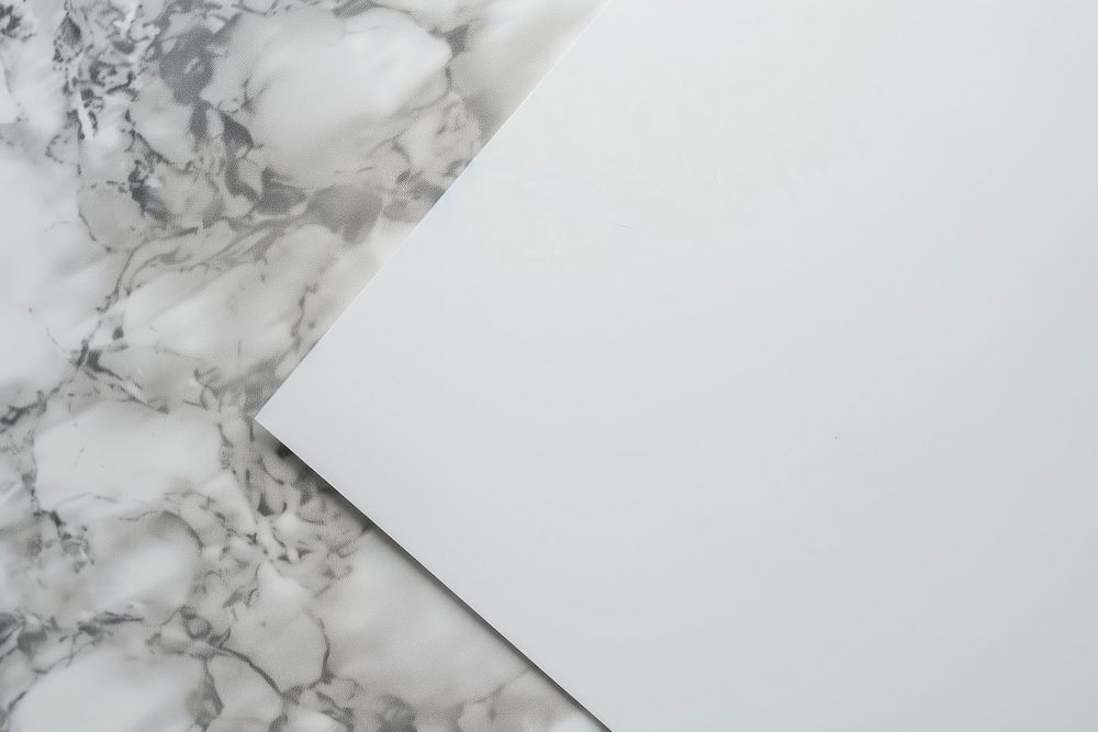 Closeup photo of a blank a4 paper mockup indoors floor interior design.