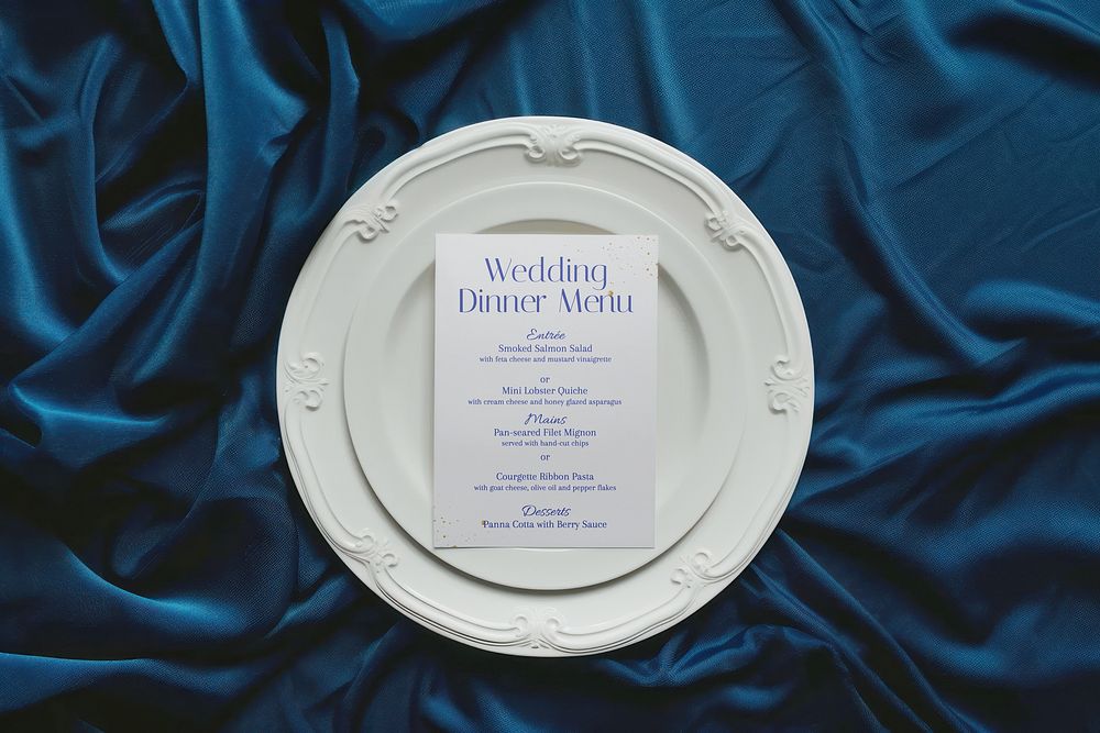 Wedding dinner menu card on plate