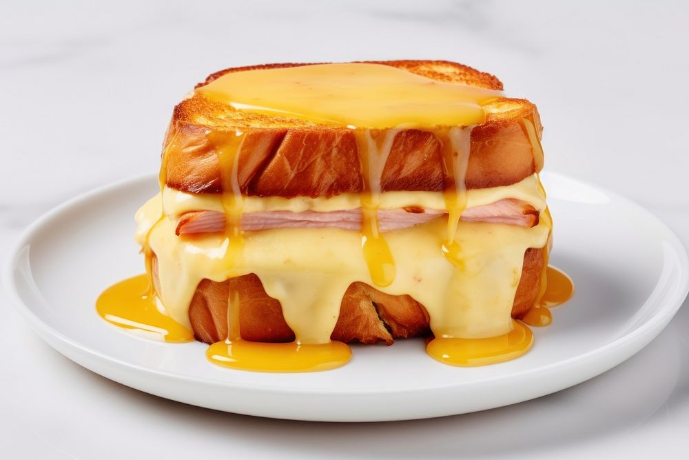 Grilled ham cheese sandwich plate food dessert.