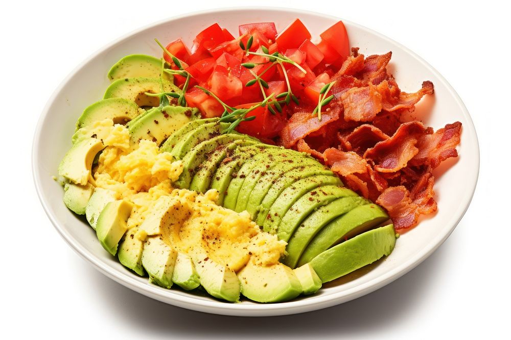 Scrambled eggs with bacon and avocado brunch sliced plate.