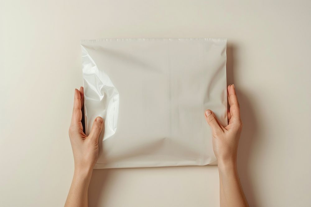 A white plastic mailing bag mockup female person paper.