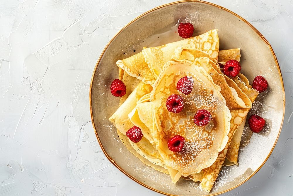 Delicious crepes with raspberries