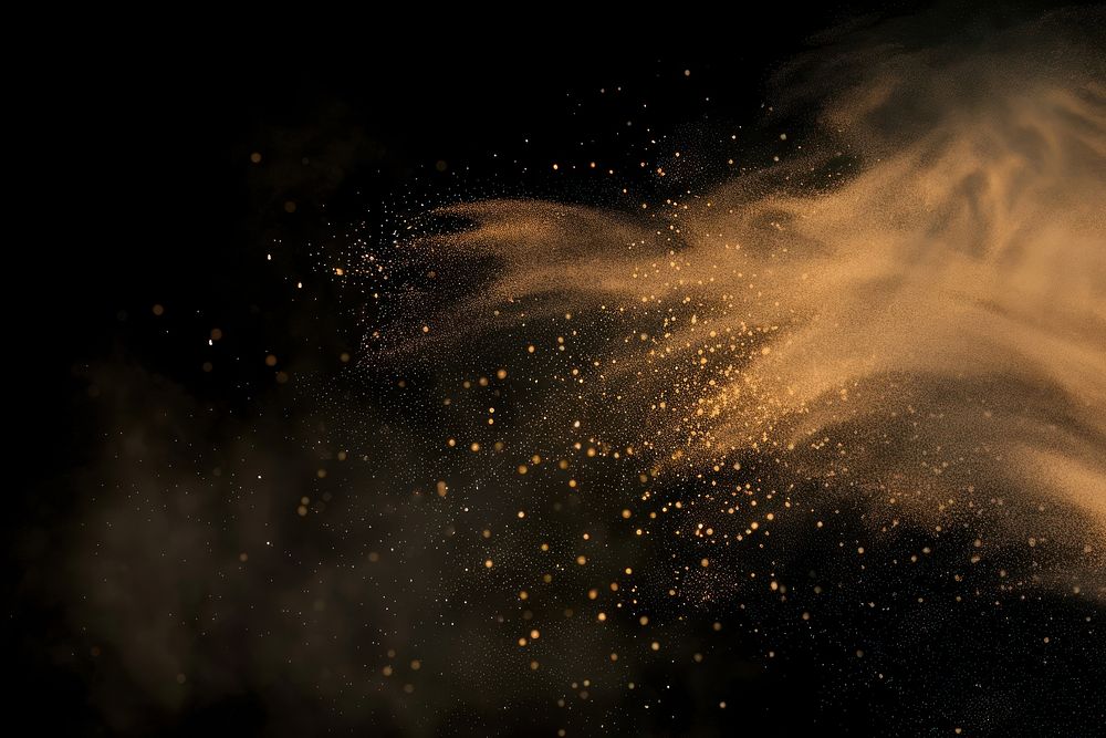 Abstract golden dust particles