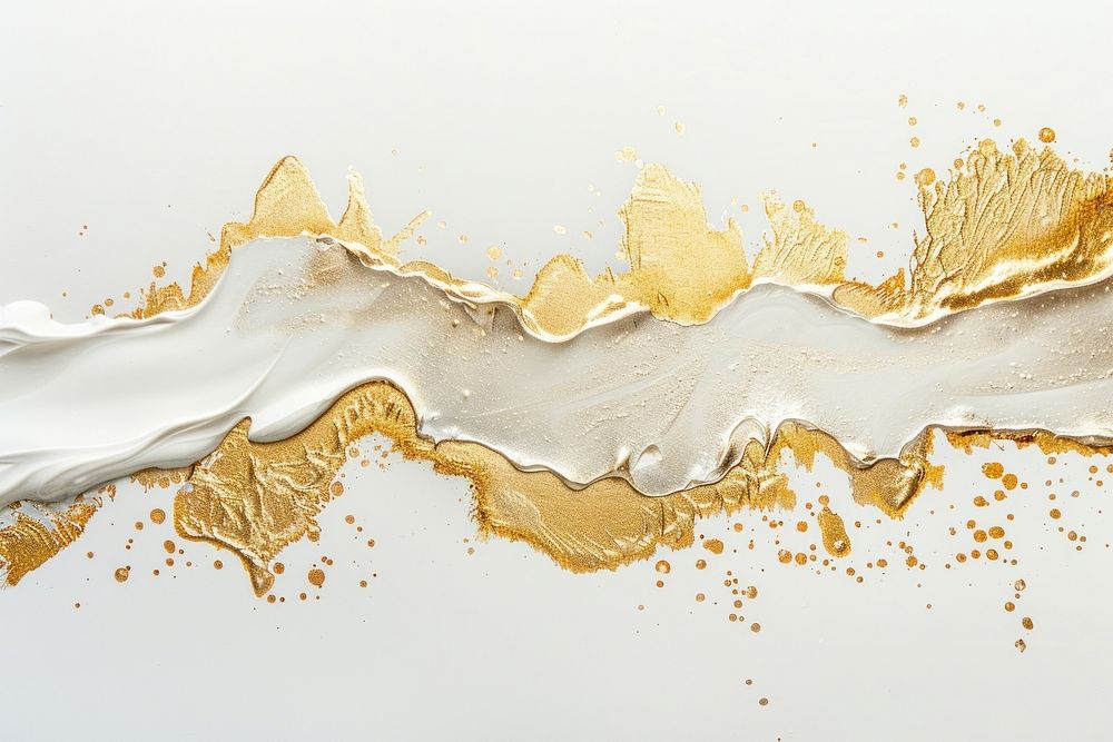 Abstract gold white paint splatter