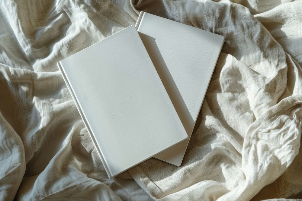 Blank books on silky fabric