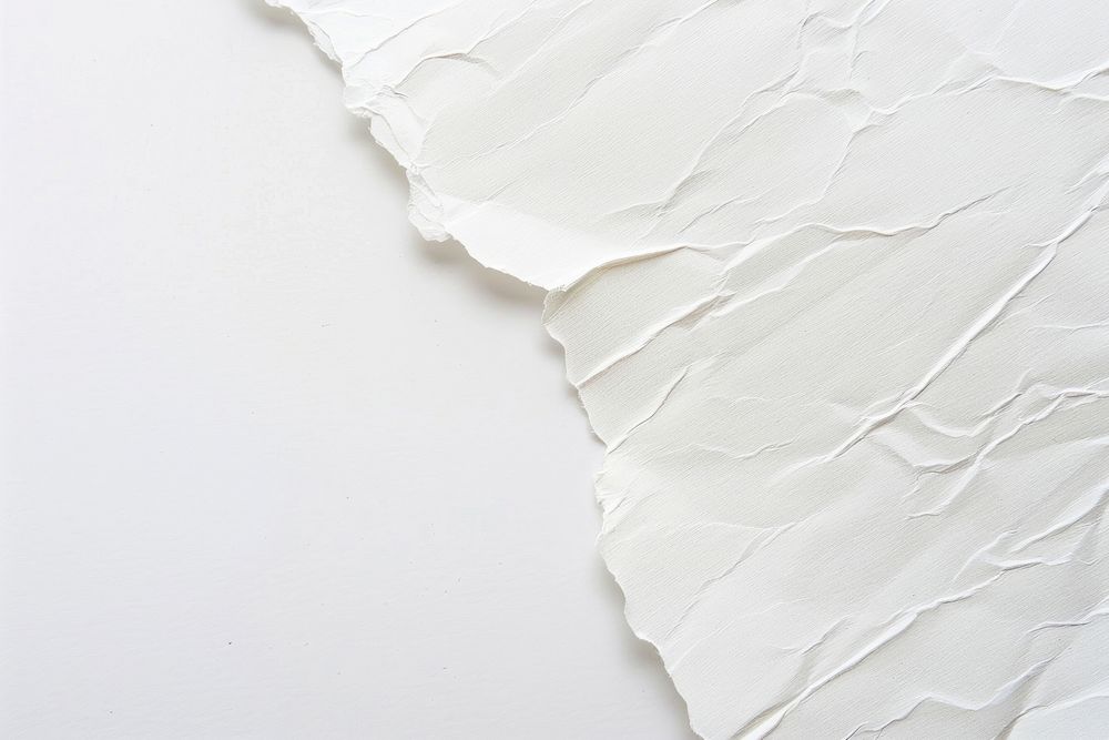 Textured torn white paper background