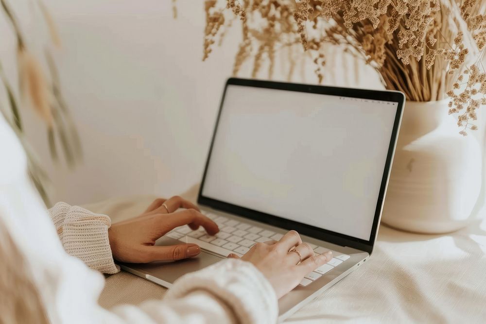 Typing laptop cozy workspace